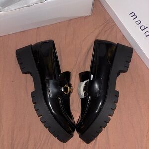 Madden Girl Glossy Black Loafers with Gold Accent